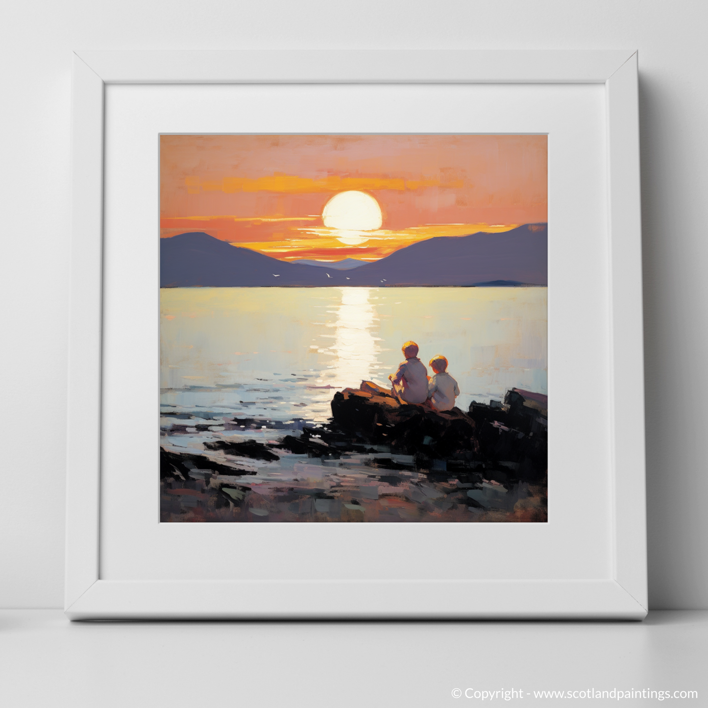 Art Print of Young explorers watching the sunset over the Isle of Arran from the peaceful Saltcoats Beach with a white frame