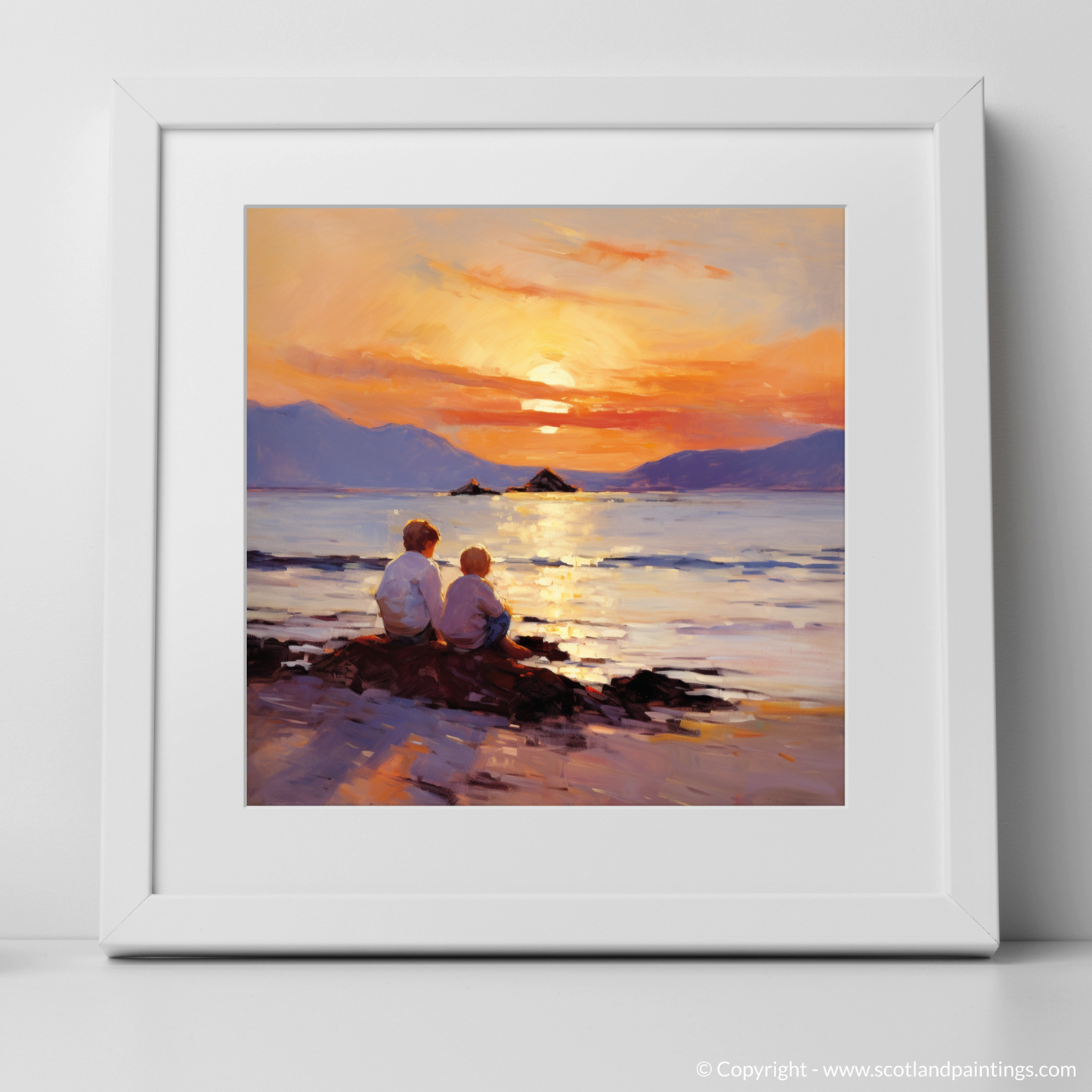 Art Print of Young explorers watching the sunset over the Isle of Arran from the peaceful Saltcoats Beach with a white frame